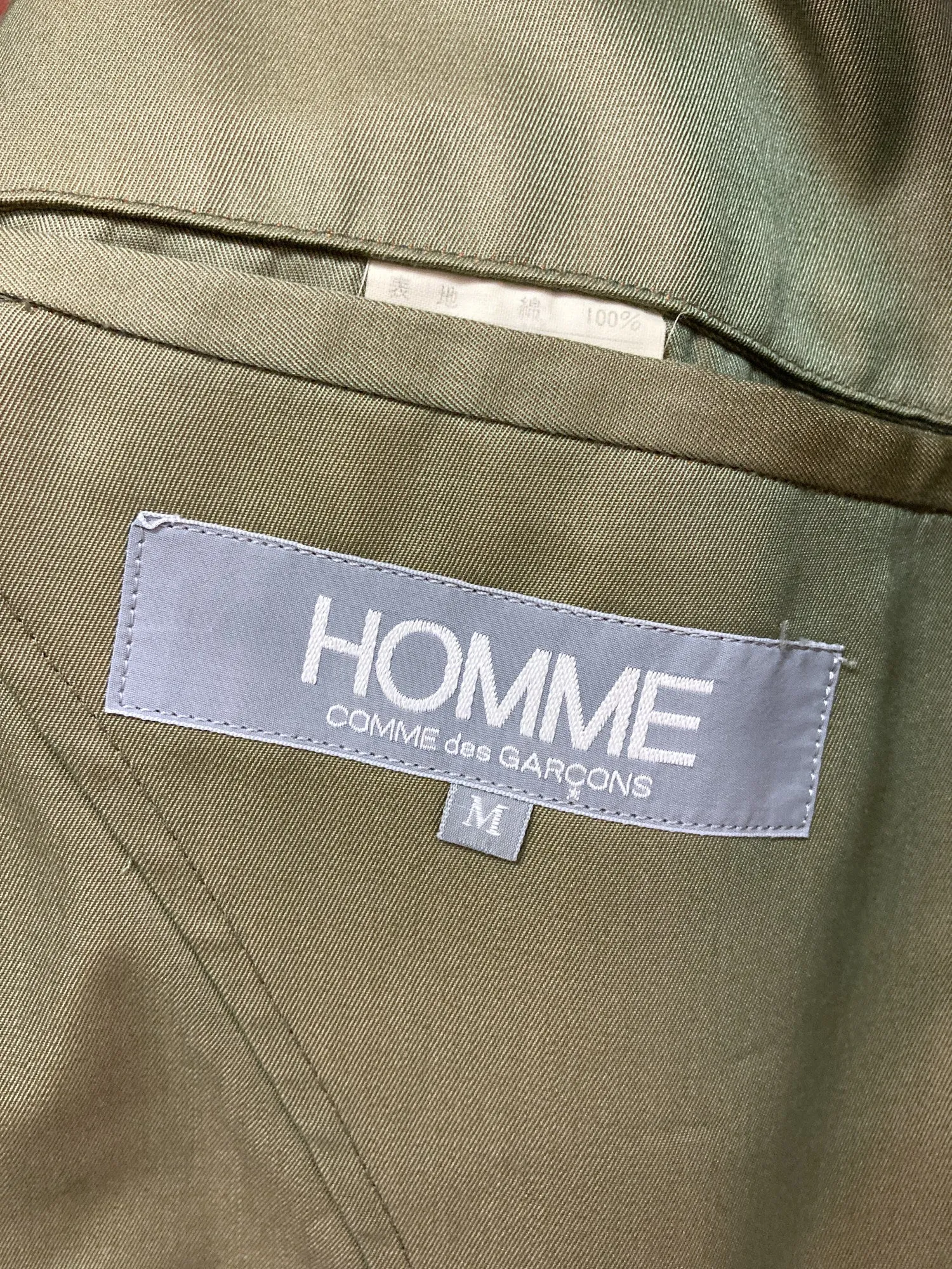 Homme Comme des Garcons 1980s khaki cotton iridescent covered placket coat - M