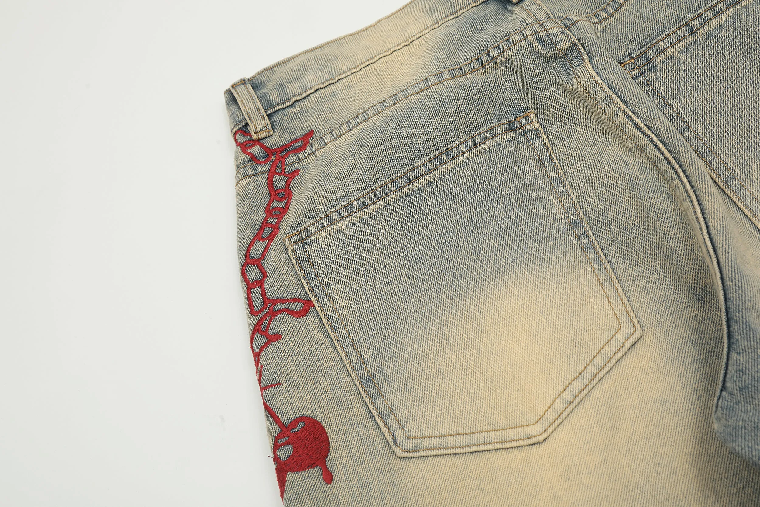 Red Chain | Faded Patterned Denim Jeans